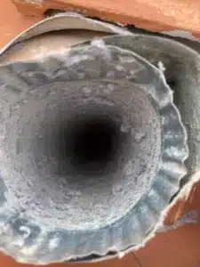dryer vent before cleaning- American Air Duct Services
