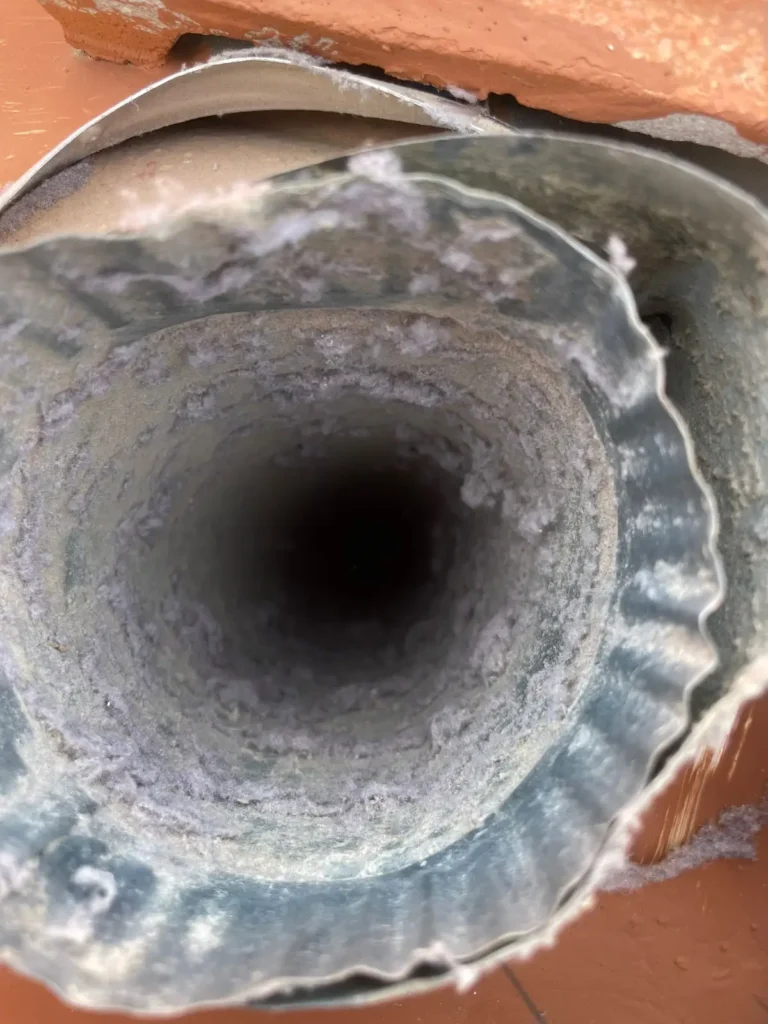 dryer vent before cleaning- American Air Duct Services