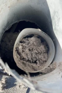 dryer vent dust build up- American Air Duct Services