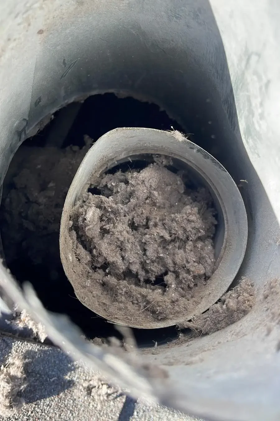 dryer vent dust build up- American Air Duct Services